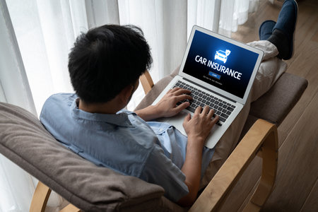 car insurance online website on computer screen for insure your car damage snuglyの写真素材