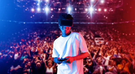 Adult holding joystick and wearing VR goggles while enjoy playing games at stadium with blurring...