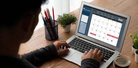 Calendar on computer software application for modish schedule planning for personal organizer and online businessの写真素材