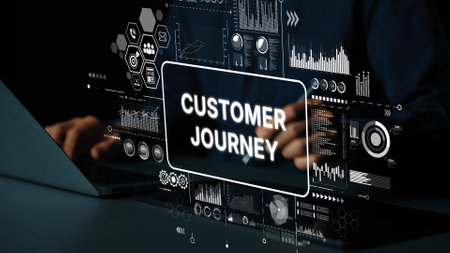 Person Analyzing Customer Journey Data with Digital Charts and Graphs on Laptop Screen in Modern Workspace. Asymptotic smart data analytic.の写真素材