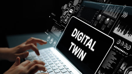 Digital Twin Concept Displayed on Laptop with Data Visualization and Analytics Graphics in Dark Environment. Asymptotic smart data analytic.の写真素材