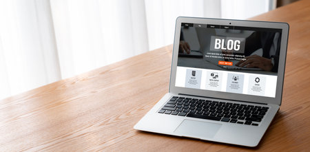 blogging concept, web blog Social Media Information network snugly. social media online content, freelance worker, working online, content creator, blogger, website, reading blog online on computerの写真素材