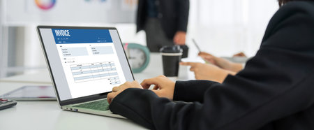 Invoice on computer screen from accounting application. Computer program for financial and budget of corporate business.の写真素材