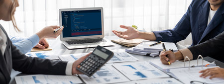 Business intelligence and data analysis concept. Analyst team working on financial data analysis dashboard on laptop screen as marketing indication for effective business strategic planning. Insightの写真素材