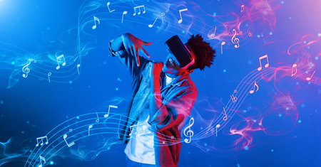 Man with casual clothing singing while wearing VR glasses surrounded by music notes holographic. Person enjoys listening and singing while using augmented reality connecting to the metaverse. Ingenuity.の写真素材