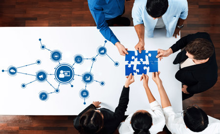 Team members engage in a collaborative digital marketing strategy session, piecing together ideas...