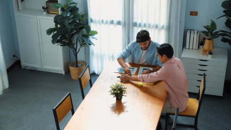 Top view of businessman preparing document for presenting marketing idea or creative startup project to manager. Male leader attend meeting while talking to investor about investment. Convocation.の写真素材