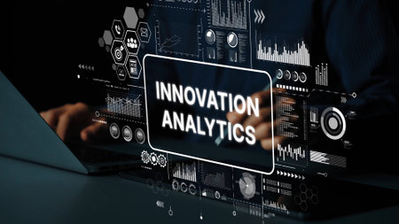 Hands Engaging with Data Visualization and Innovation Analytics Concept Displayed on Modern Laptop Screen. Asymptotic smart data analytic.の写真素材