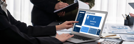 Panorama shot analyst team utilizing BI to analyze financial report with laptop. Businesspeople...