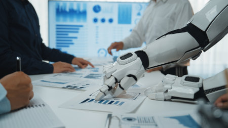 A robotic hand analyzes charts and graphs during a business meeting. Professionals collaborate around a table, discussing data-driven insights and future strategies.の写真素材