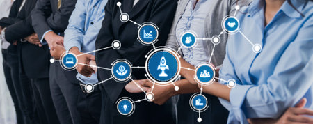 Featuring a group of diverse professionals engaged in collaboration, this image highlights the...