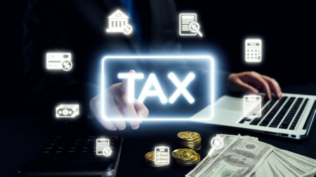 A business professional interacts with digital elements representing tax concepts. The scene captures financial details, including money and calculators, in a modern office environment.の写真素材