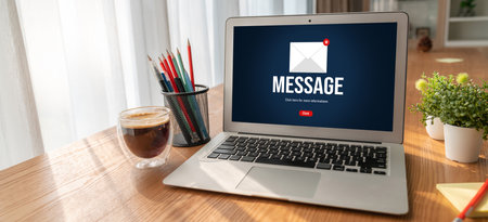 Email notification message showing on computer screen snugly. Digital marketing message information text from business to customer clientの写真素材