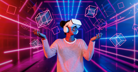 Girl looking around at geometric shape floating in metaverse. Happy teenager or gamer using VR...