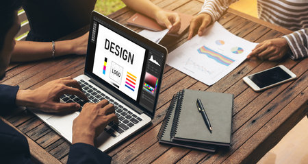 Graphic designer software for modern design of web page and commercial ads showing on the computer...