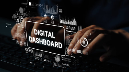 Hands Using Keyboard to Interact with Digital Dashboard and Analytics Interface for Data...