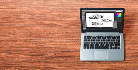 Electric car design software on computer screen showing simulation blueprint snugly by digital calculating application for manufacturing preparationの写真素材