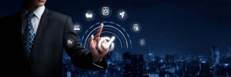 Business person enforces strict quality assurance protocols, ensuring QC and QA standards are met. Achieving certified product excellence through dedicated quality assurance.の写真素材