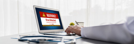 Virus warning alert on computer screen detected brisk cyber threat , hacker, computer virus and malwareの写真素材
