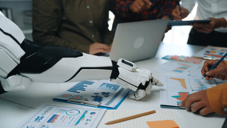 A modern business meeting showcasing a robotic arm assisting in data analysis, highlighting teamwork...