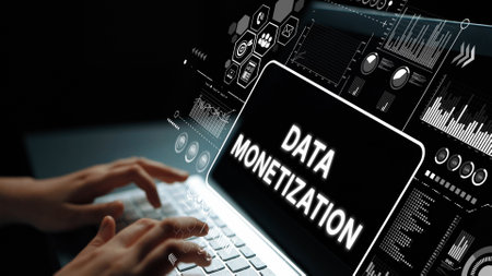 Hands Typing on Laptop with Data Monetization Concept and Digital Graphics in a Dark Environment....