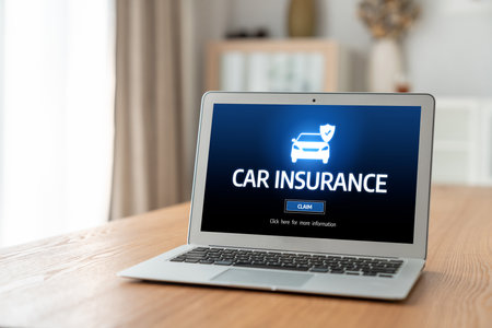 car insurance online website on computer screen for insure your car damage snuglyの写真素材