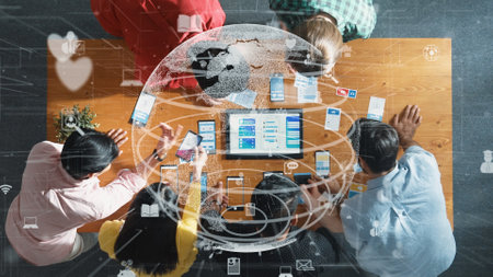 Top aerial view of skilled business team working together to design Ux Ui designing. Group of...