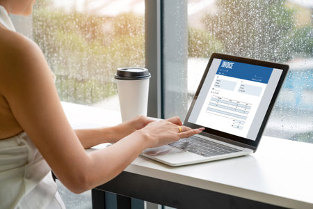 Invoice on computer screen from accounting application. Computer program for financial and budget of corporate business. Snugly.の写真素材