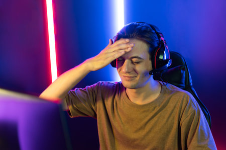 Host channel of gaming smart streamer playing online game to be failed with harder mission record by live steaming on media social for new strategy planning with team player at neon room.の写真素材