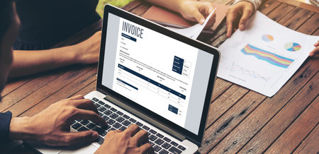 Invoice on computer screen from accounting application. Computer program for financial and budget of corporate business. Snugly.の写真素材