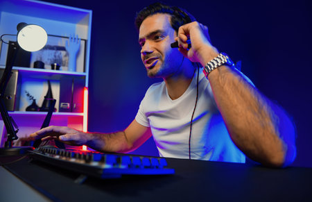 Smart gaming streamer talking with team member players using headset and mic for communicate with...