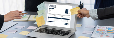Invoice on computer screen from accounting application. Computer program for financial and budget of...