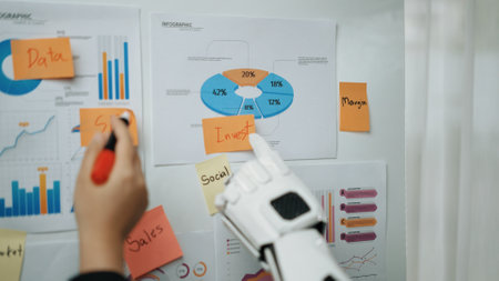 A robot hand highlights an infographic on a wall filled with sticky notes, showcasing data and...