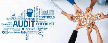 A diverse group of hands assemble a wooden puzzle around an audit checklist, symbolizing teamwork in compliance, analysis, and processes in a business environment. Amityの写真素材