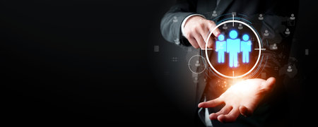 Business person analyzes data to identify customer target groups, refining marketing strategies. Tailoring messages to meet the specific needs of each target group. FaaSの写真素材