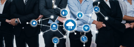 A professional gathering showcasing cloud computing technology with business professionals in formal attire. The image highlights connectivity and collaboration in the digital age. Amityの写真素材