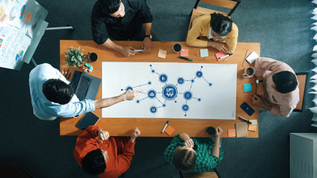 Top view of business people discussing and explain about plan. Top view of marketing team working...