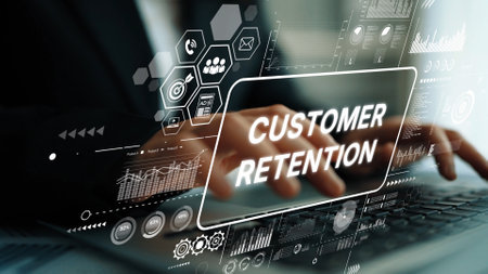 Hands Typing on Laptop with Graphic Overlay Highlighting Customer Retention Strategies and Data Analytics in Business Environment. Asymptotic smart data analytic.の写真素材