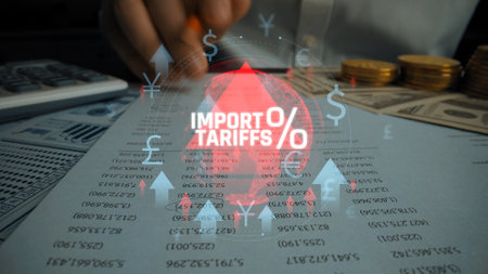 Analysis of Import Tariffs and Tax Documentation with Financial Graphics and Calculator in Background. Consignment.の写真素材