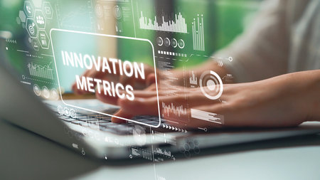 Hands Typing on Laptop with Overlay of Innovation Metrics and Data Visualization Analytics in Modern Office Setting. Asymptotic smart data analytic.の写真素材