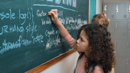 American student studying coding engineering prompt while writing answer on blackboard. Intelligence girl planning and learning about coding development plan. Successful child sharing idea. Pedagogy.の写真素材