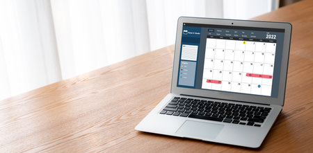 Calendar on computer software application for modish schedule planning for personal organizer and online businessの写真素材