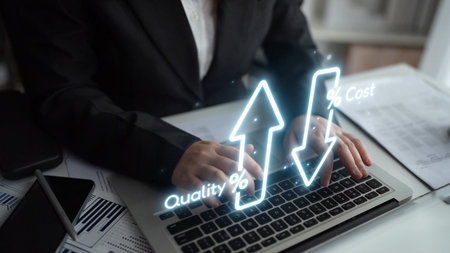 Business concept showing cost reduction and quality increase using Lean, Six Sigma, and Total...