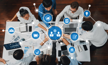 A dynamic business meeting scene showcasing diverse professionals collaborating around a table with...