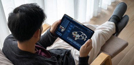 Electric car design software on computer screen showing simulation blueprint snugly by digital...