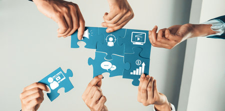 Top view panorama banner of business team assembling jigsaw puzzle over table symbolize business...