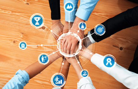 This image illustrates a diverse group of hands coming together, symbolizing collaboration,...