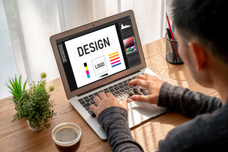 Graphic designer software for modern design of web page and commercial ads showing on the computer...