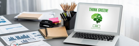 Data analysis dashboard display on laptop screen on office table with financial papers by Fintech BI technology for business marketing and strategy in corporate meeting room. Insightの写真素材