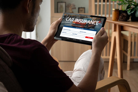 car insurance online website on computer screen for insure your car damage snuglyの写真素材